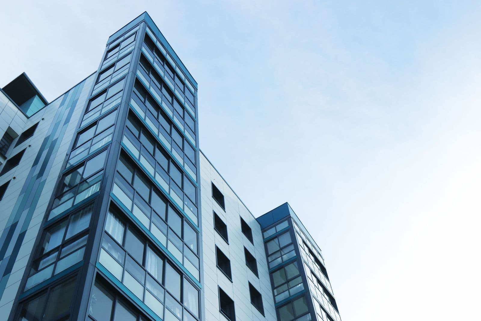 Modern building façade with aluminium rainscreen cladding and glazing